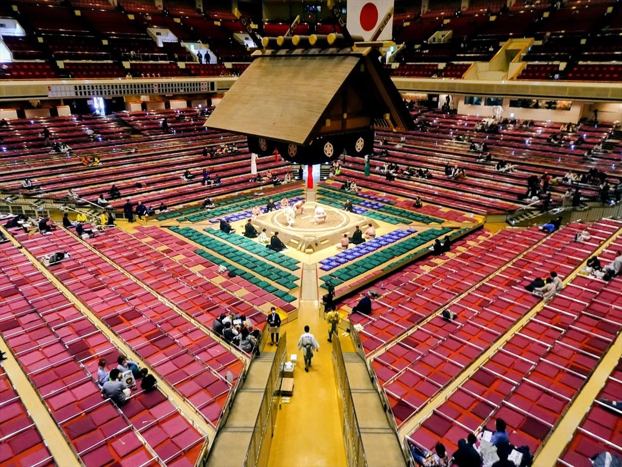 Crowd and seating inside Ryogoku Kokugikan during a Tokyo grand sumo tournament