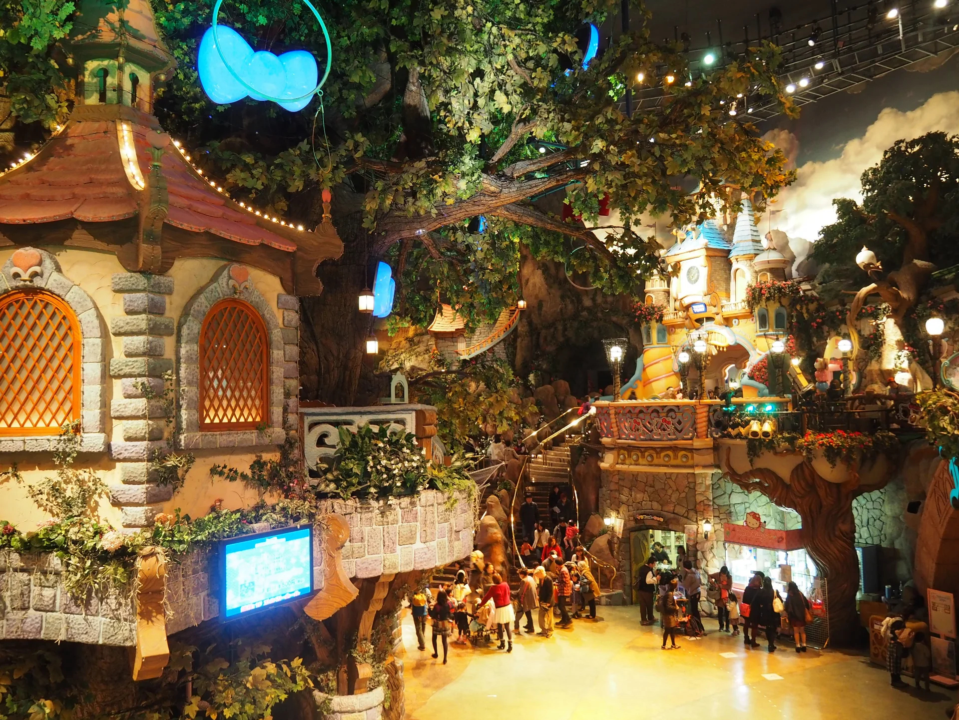 Indoor Sanrio Puroland guest area used to explain family movement, stroller limits and parade timing