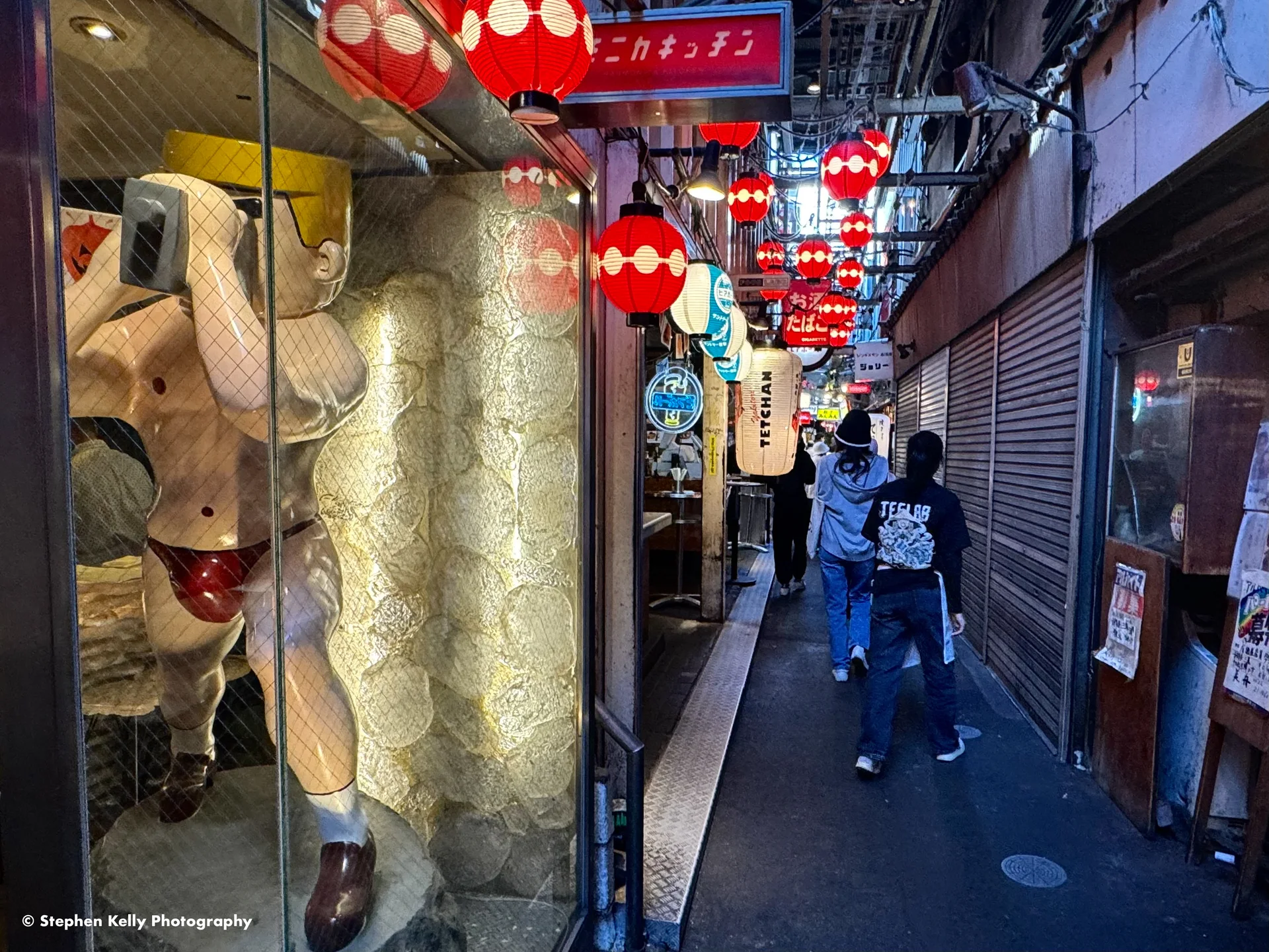 Narrow passages, lanterns and shopfronts inside Harmonica Yokocho in Kichijoji