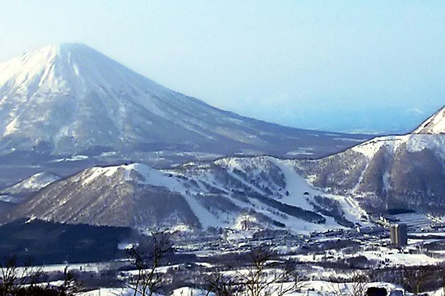 Rusutsu Resort West Mountain ski terrain with Mount Yotei in winter