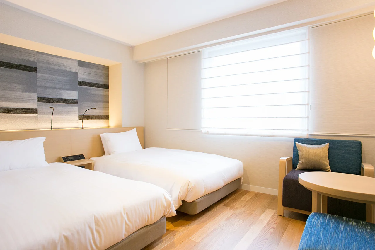 Nishitetsu Hotel Croom Hakata Comfort Twin illustrating the compact-room trade-off