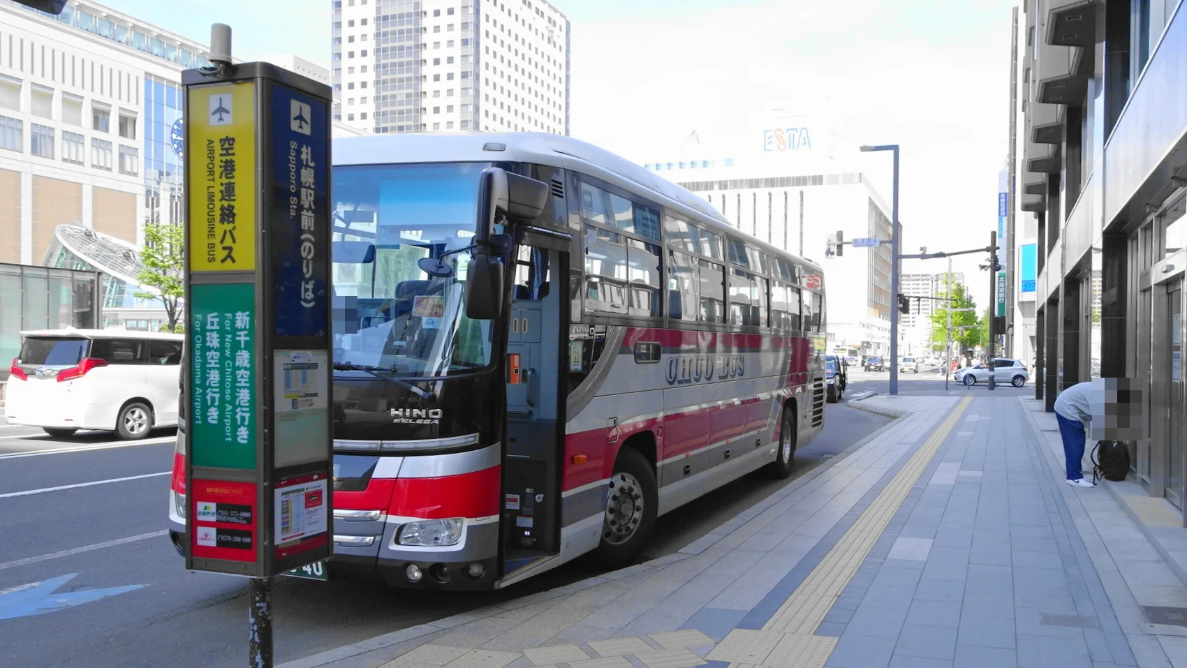 Sapporo airport bus stop after a New Chitose arrival; the direct bus is a low-transfer option but not the latest public transport