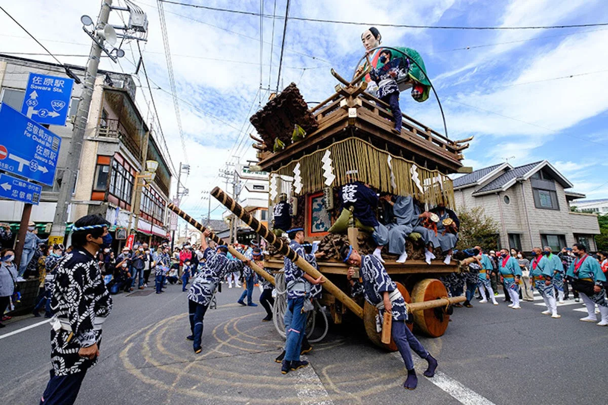 Sawara Grand Festival autumn float moving through the historic streets