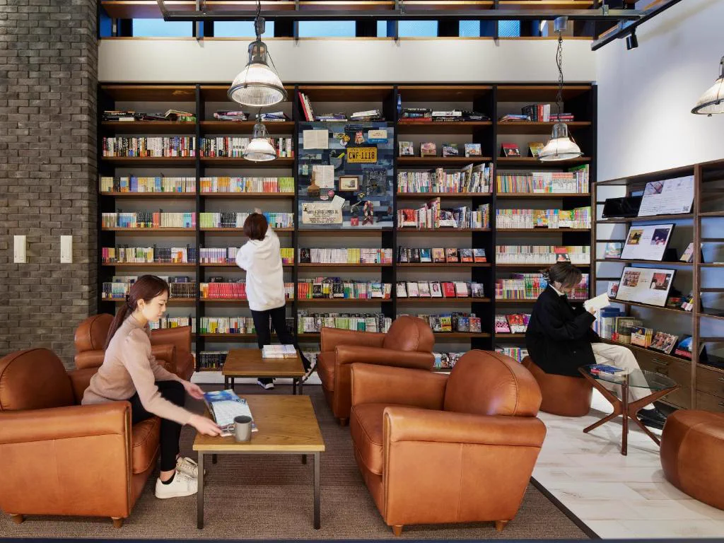 LAMP LIGHT BOOKS HOTEL Fukuoka first-floor bookstore and reading seats