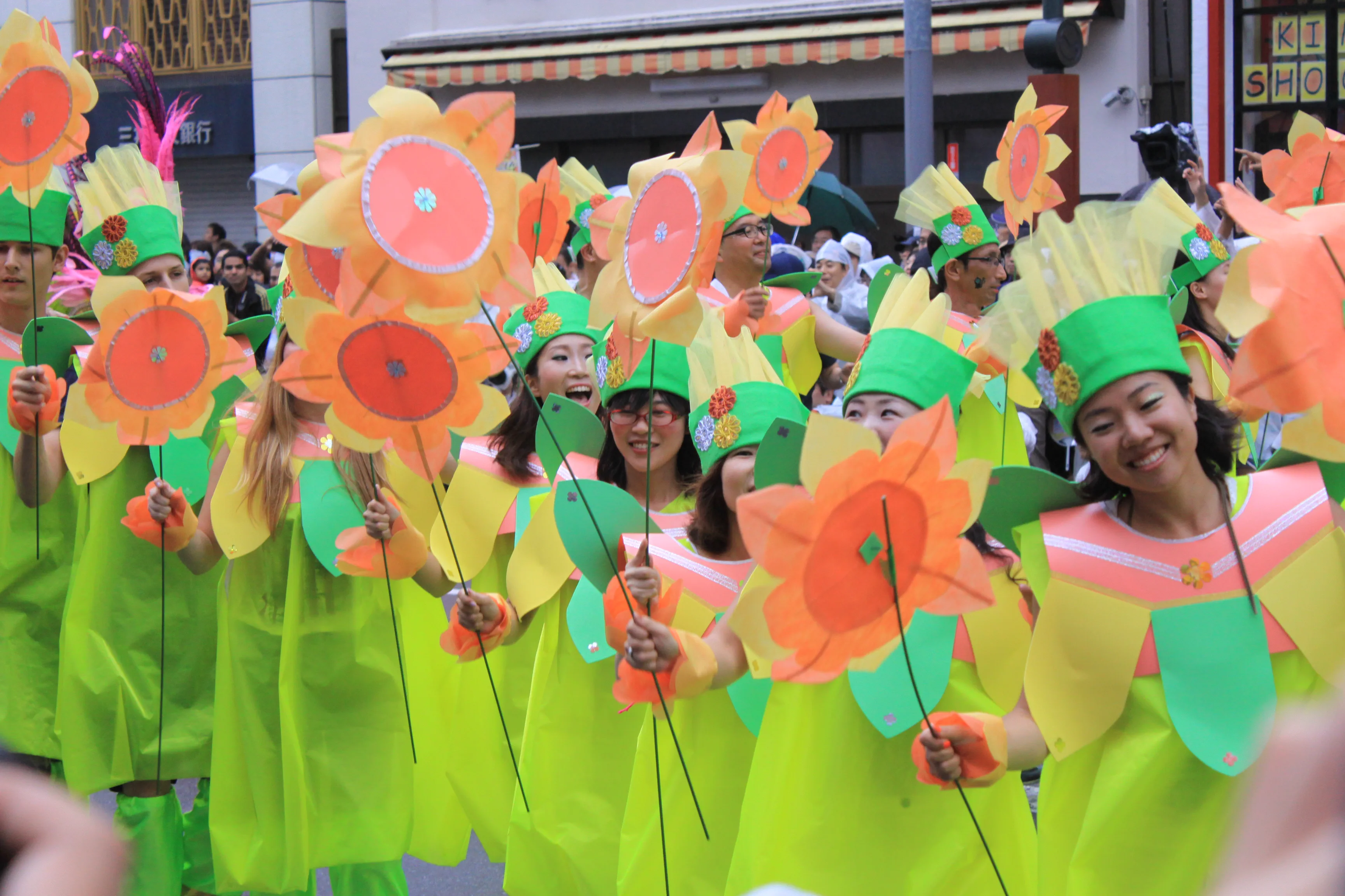 Asakusa Samba Carnival parade group moving through a crowded street