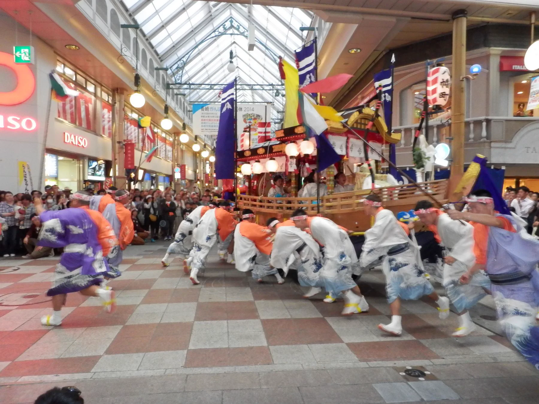 Nagasaki Kunchi festival float turning near spectators