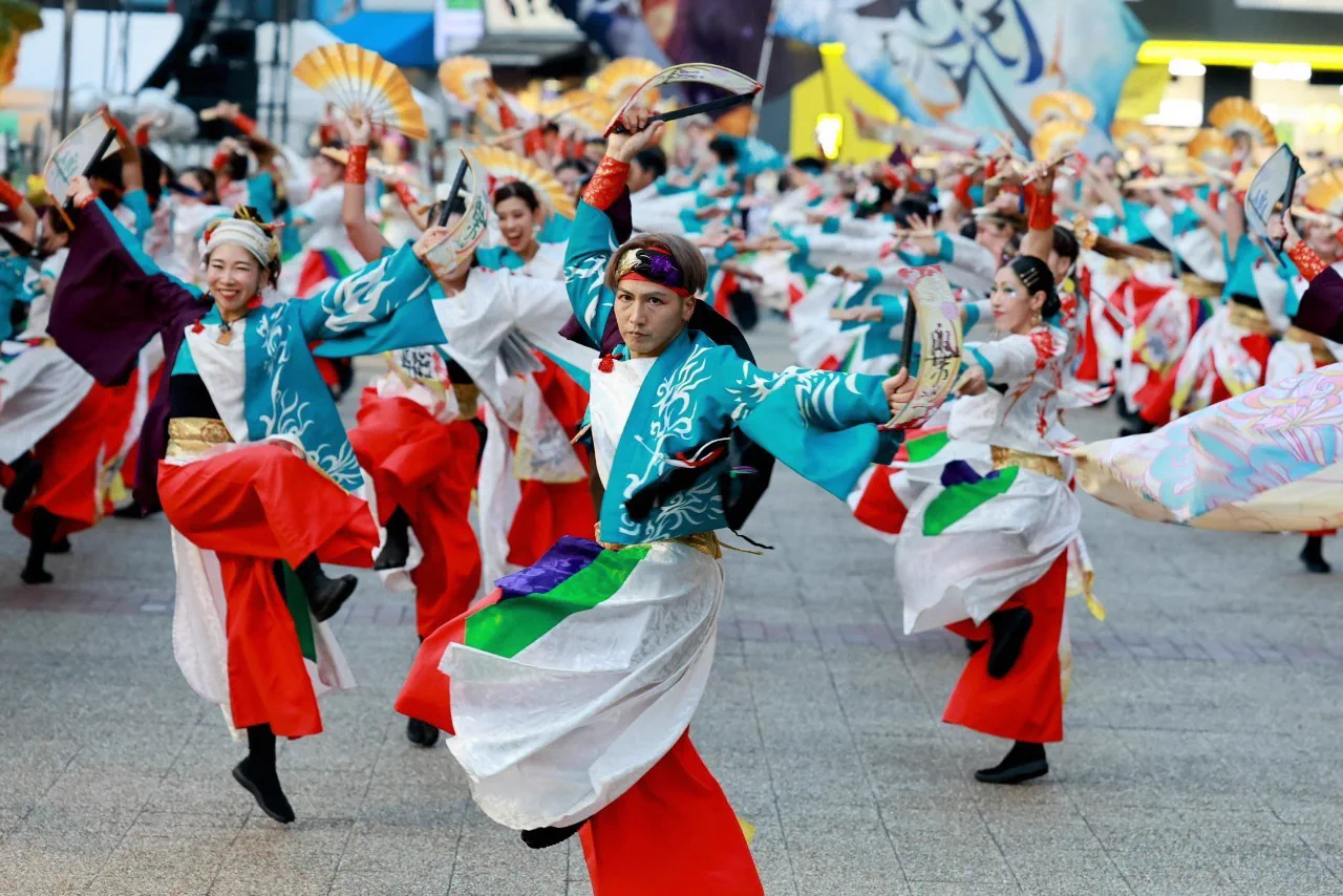 Tokyo Yosakoi dance teams performing for crowds around Ikebukuro West Exit
