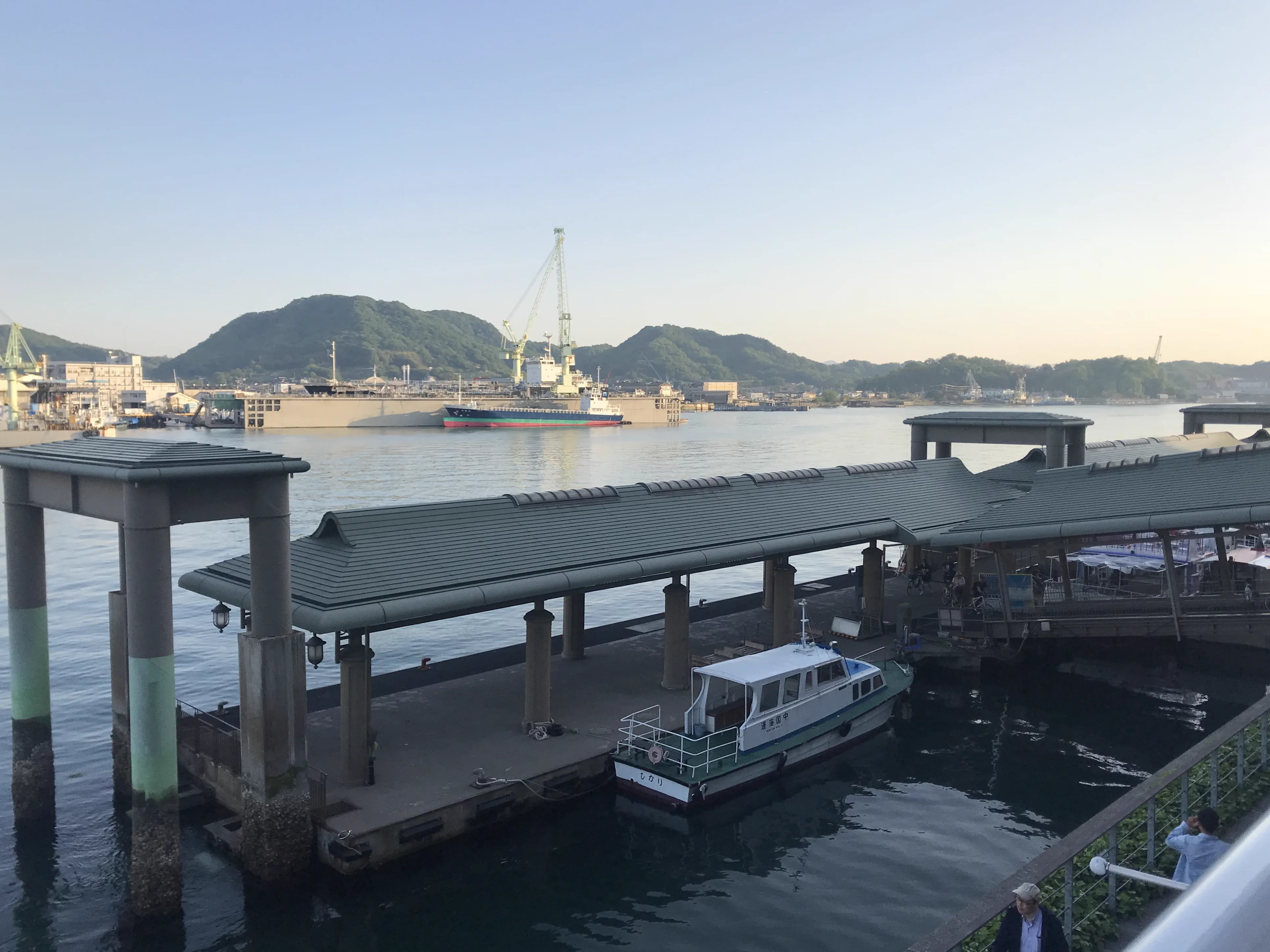 Onomichi waterfront and ferry toward Mukaishima at the Shimanami Kaido start