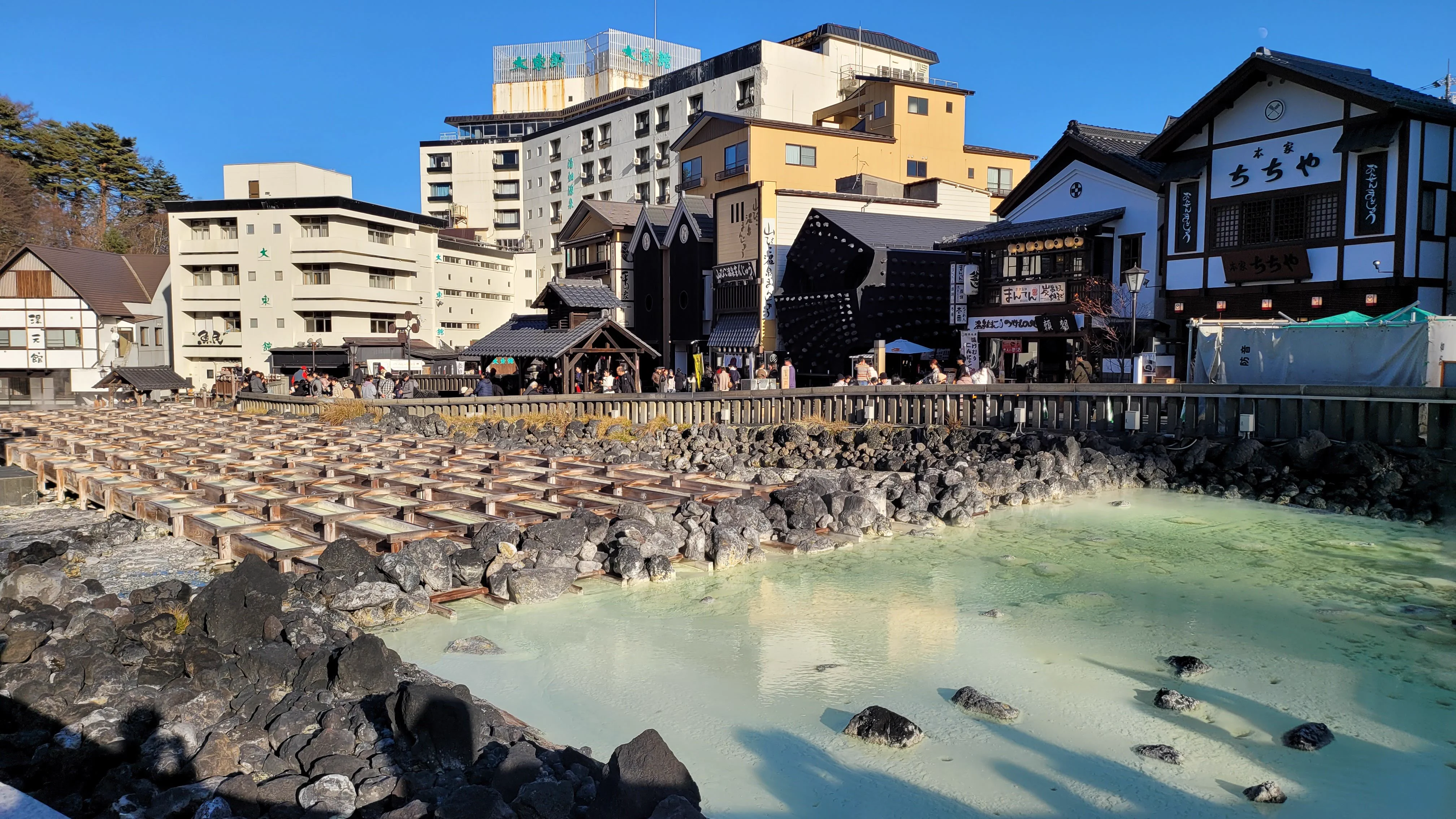 Kusatsu Yubatake and an onsen town evening, showing why ryokan value includes the hours around the room as well as the bed