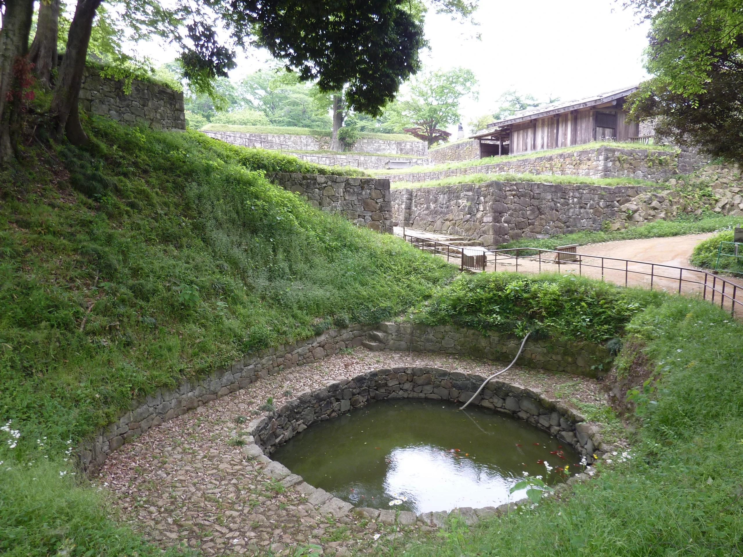 Tsuki-no-Ike pond and Ote entrance stonework at Nitta Kanayama Castle in Ota, Gunma