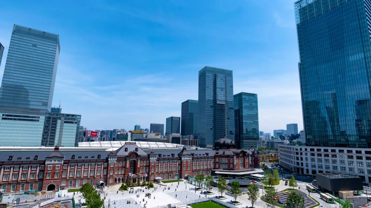 Tokyo Station's red-brick Marunouchi facade and surrounding business district