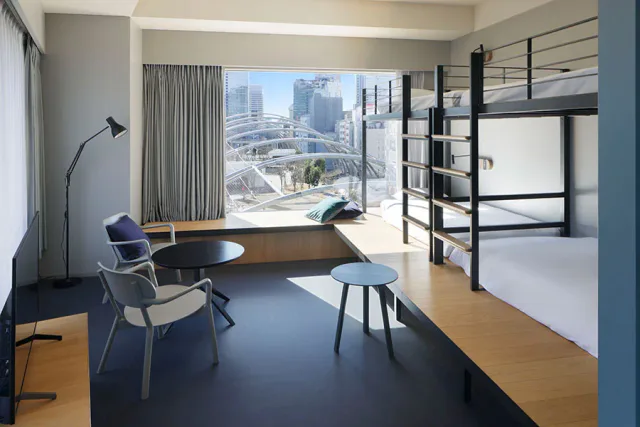 sequence MIYASHITA PARK bunk room with panoramic Shibuya view