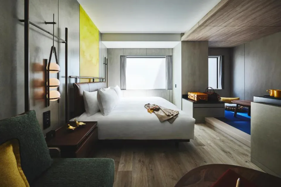 voco Osaka Central contemporary king guest room with seating area