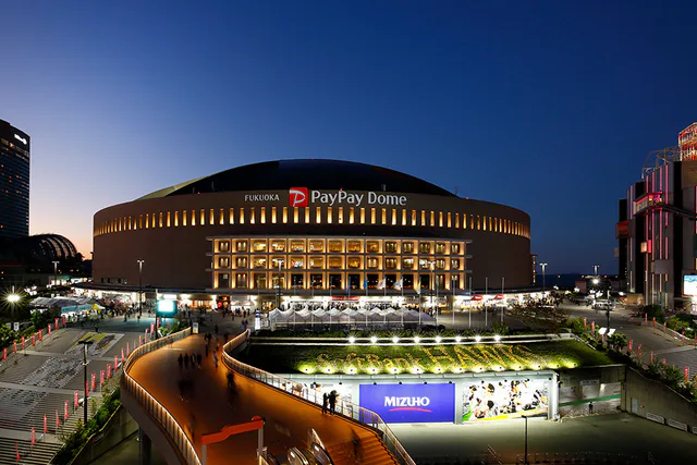 Fukuoka concert hotels and MIZUHO PayPay Dome at night after a major event