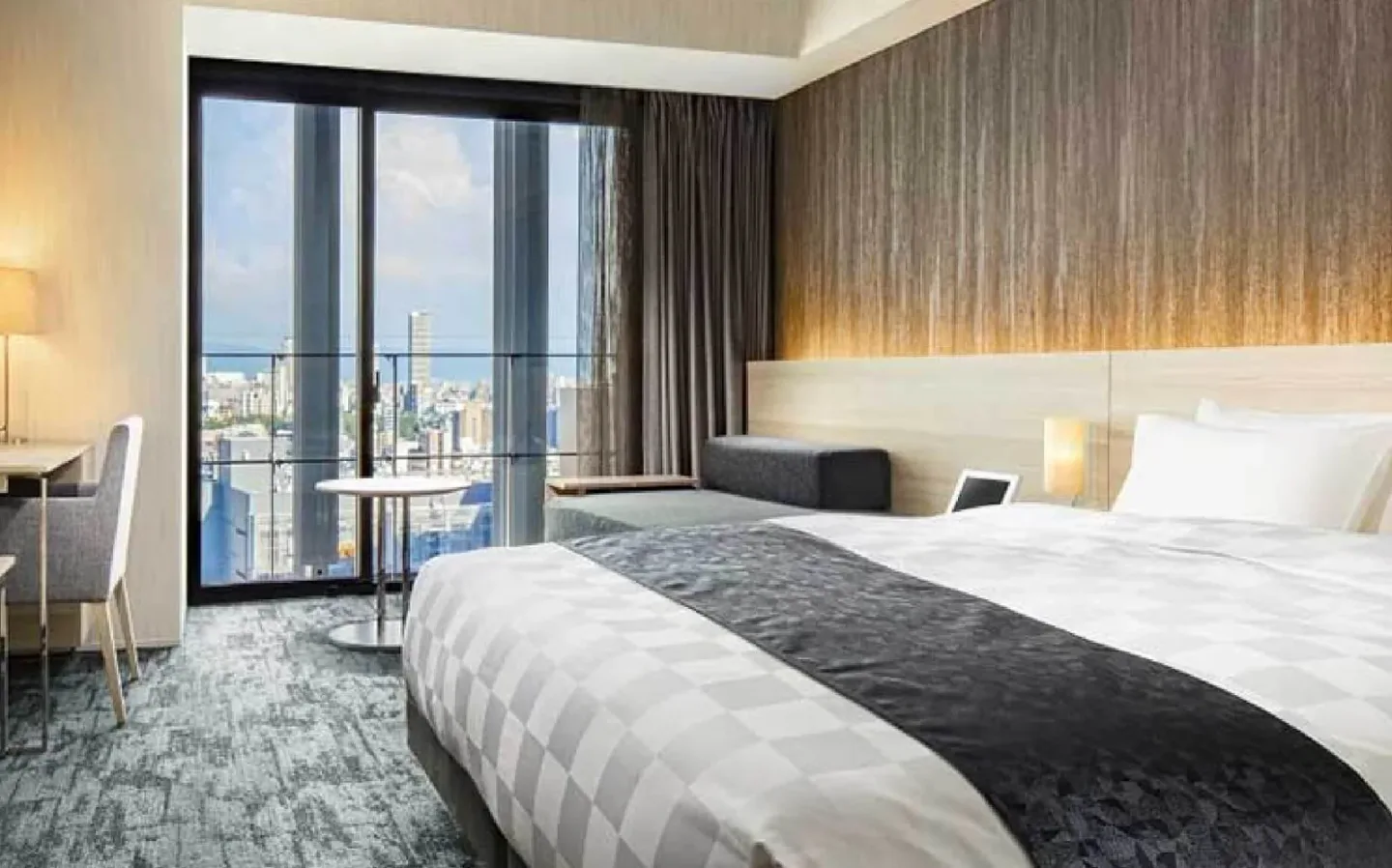 Hotel Royal Classic Osaka Premium Room overlooking the Namba cityscape