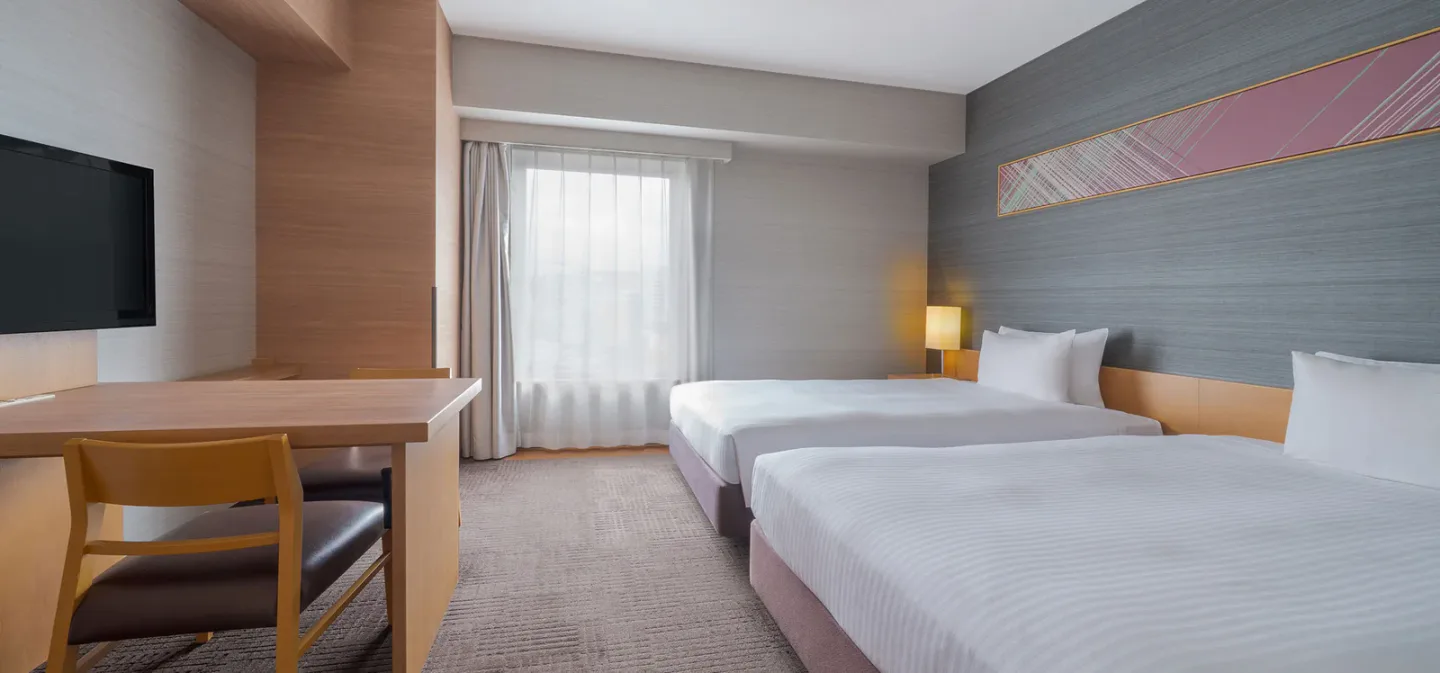 HOTEL RESOL TRINITY HAKATA deluxe twin room with calm interior
